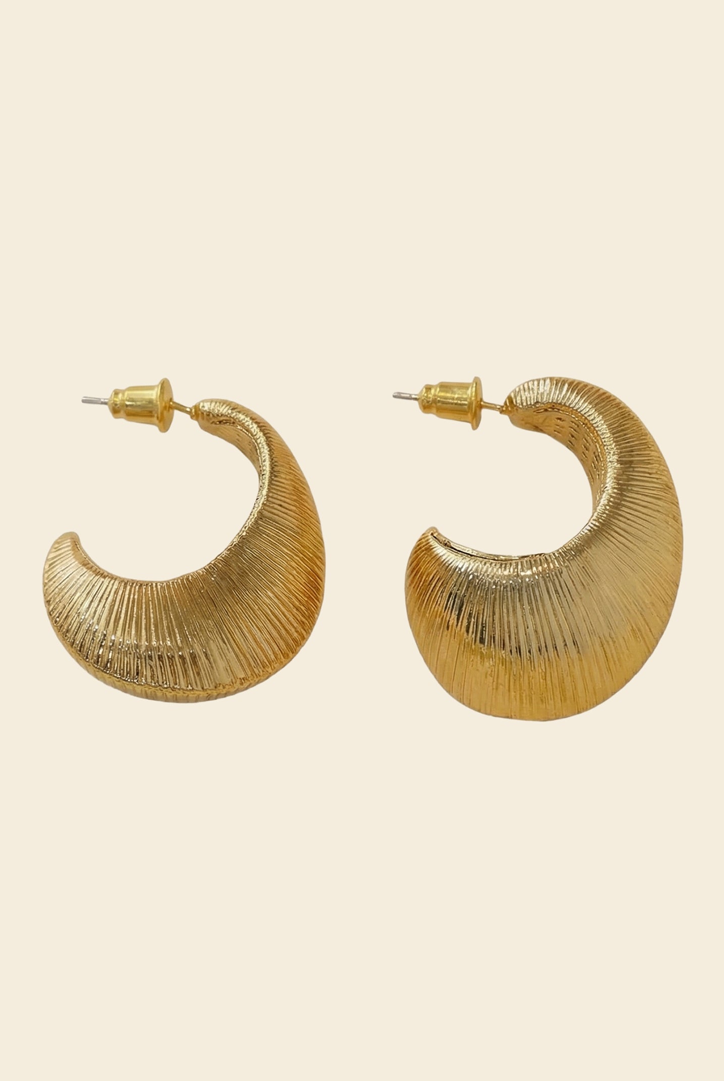 Textured Oval C-Hoop Earrings by LINTICO