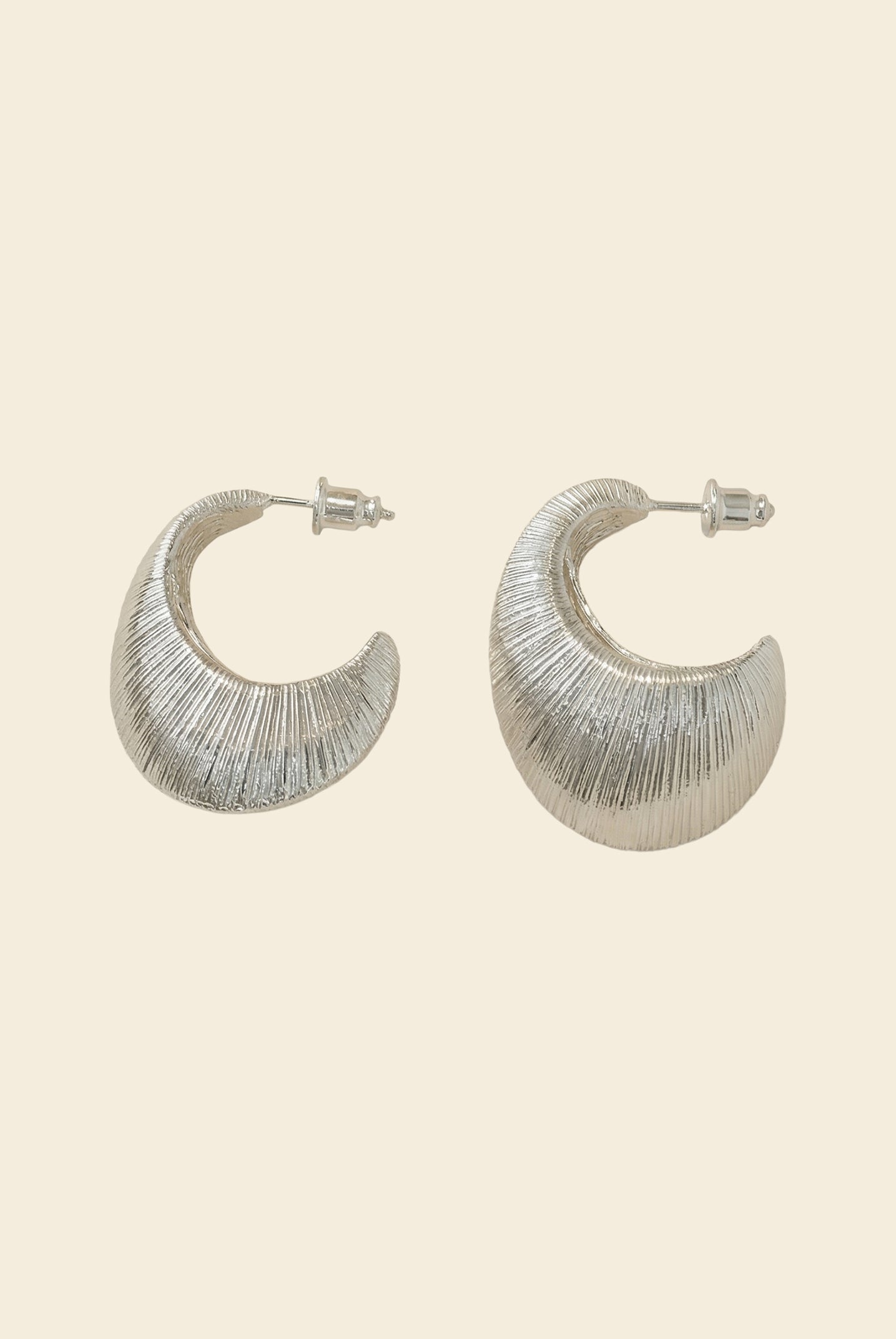 Textured Oval C-Hoop Earrings by LINTICO