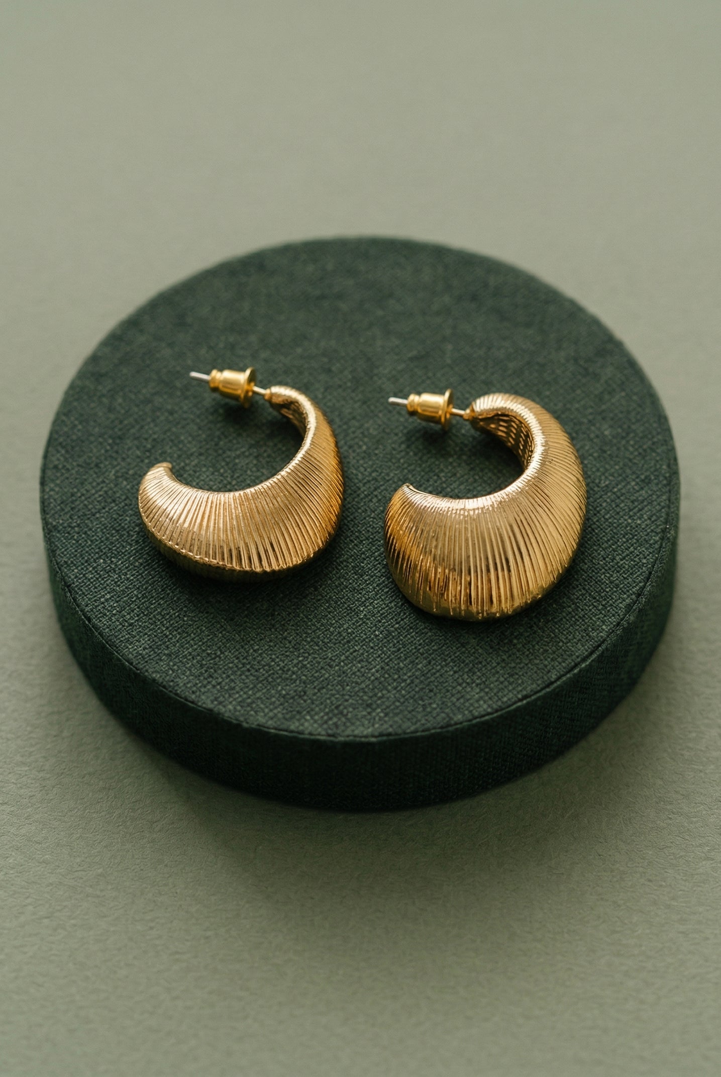 Textured Oval C-Hoop Earrings by LINTICO