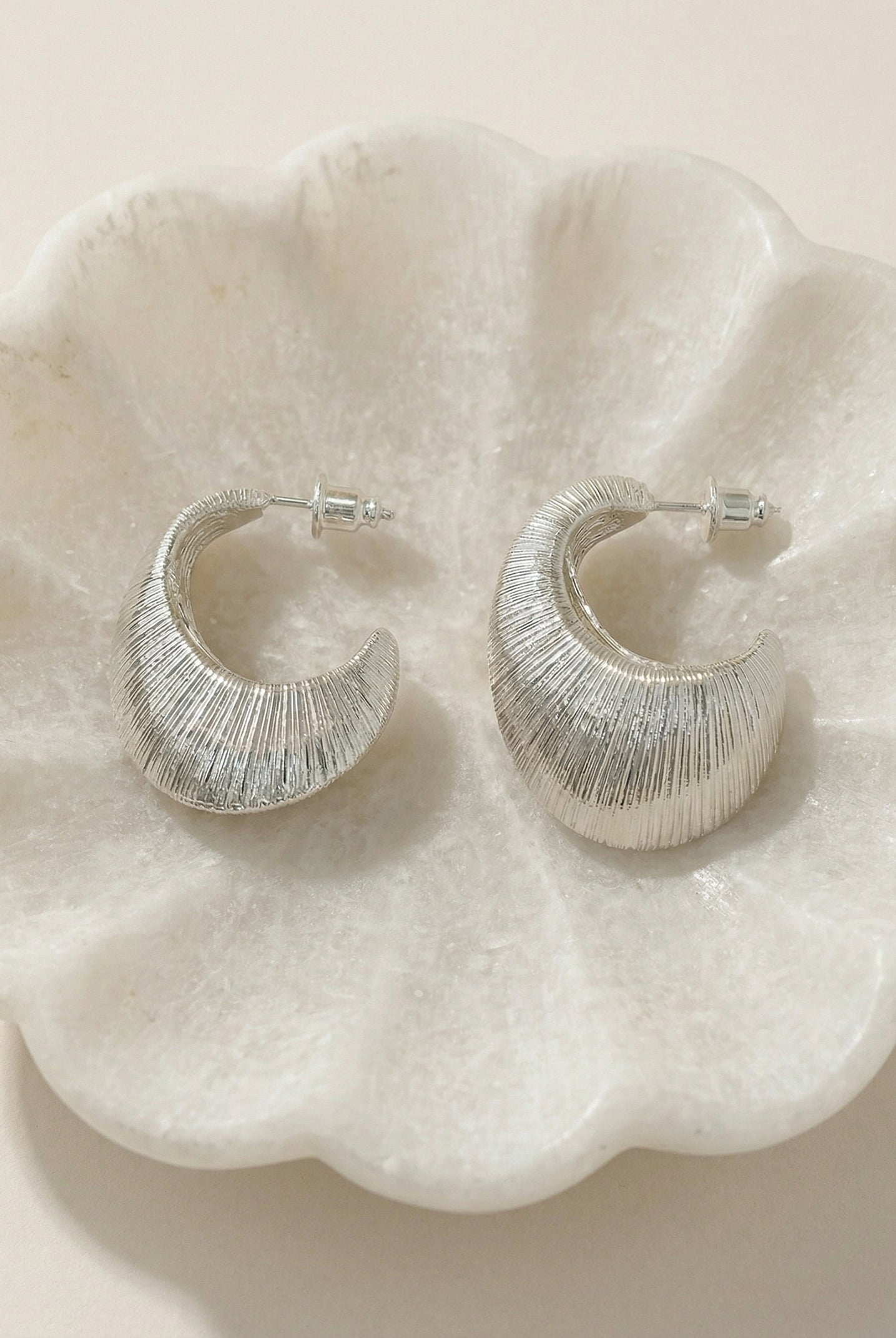 Textured Oval C-Hoop Earrings by LINTICO