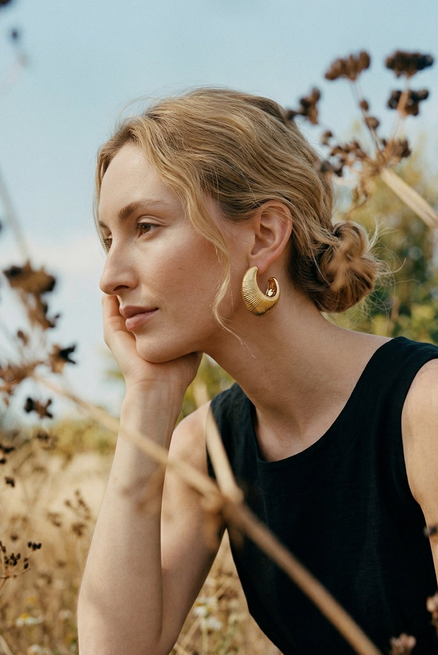 Textured Oval C-Hoop Earrings by LINTICO