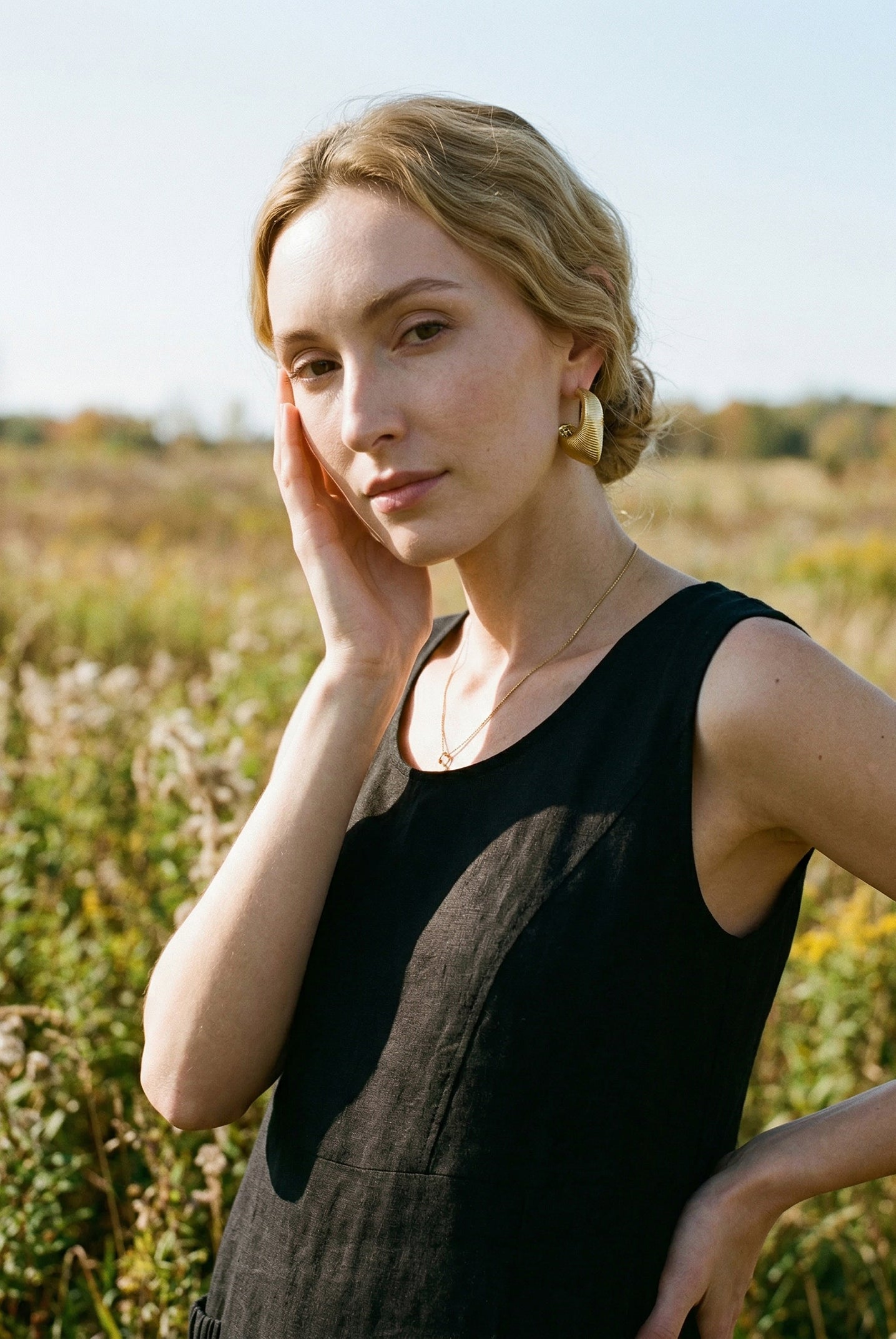 Textured Oval C-Hoop Earrings by LINTICO