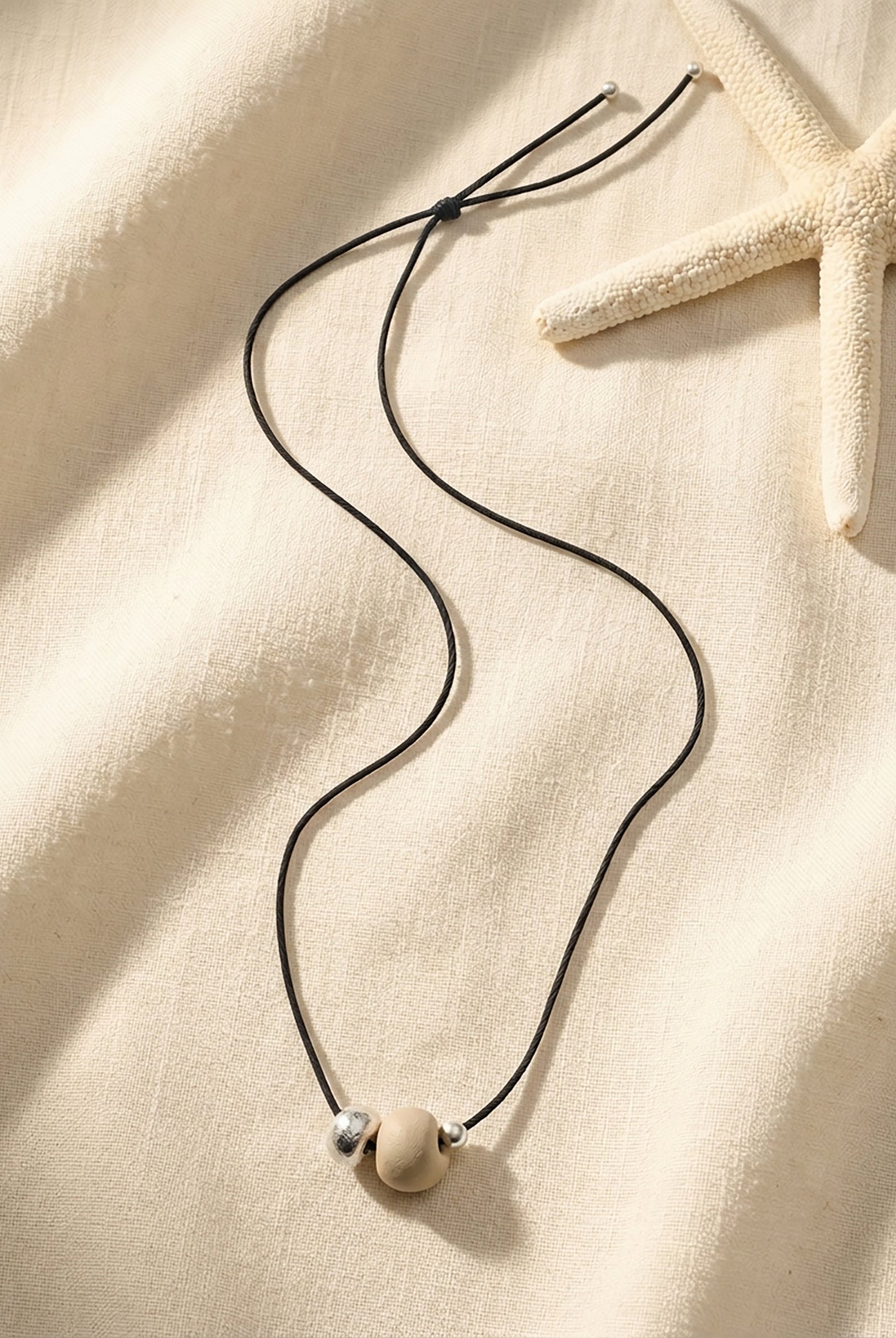 Ivory Nut Pendant Cord Necklace by LINTICO