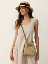 Mini Handwoven Raffia Drawstring Crossbody Bag by LINTICO for women