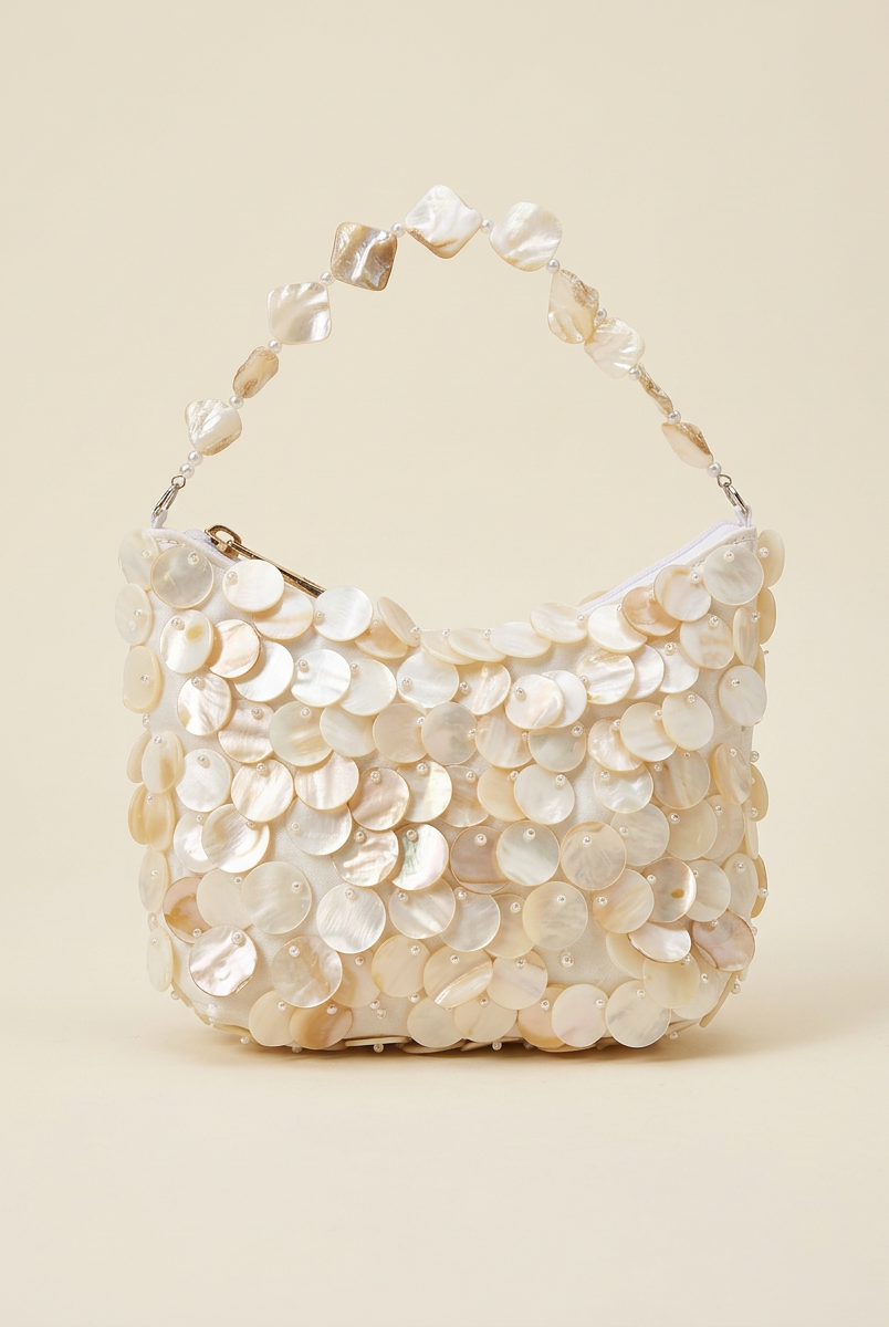 Luxe Handcrafted Mother of Pearl Disc Clutch for Special Occassion & Summer Vacations by LINTICO