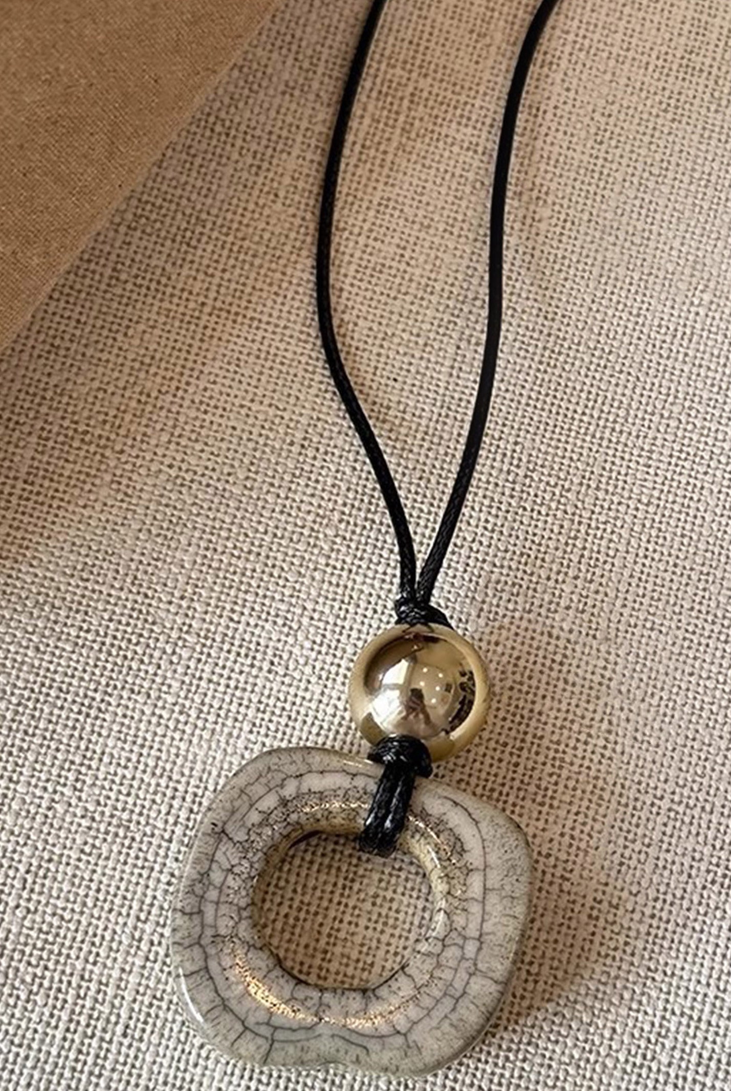 Long Sweater Necklace With Resin Camel Bone Pendant by LINTICO for women