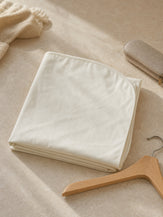 Pale yellow natural cotton hanging garment dust cover by LINTICO