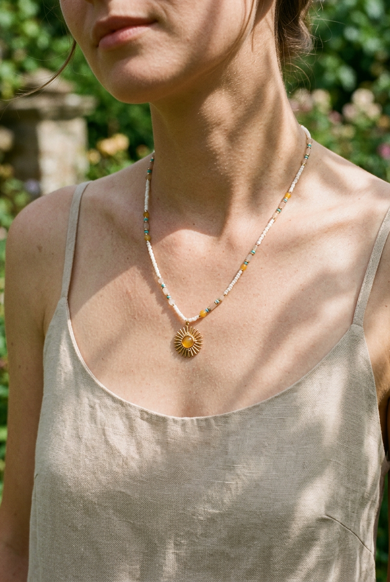 Natural Stone Beaded Necklace with Sun Pendant by LINTICO