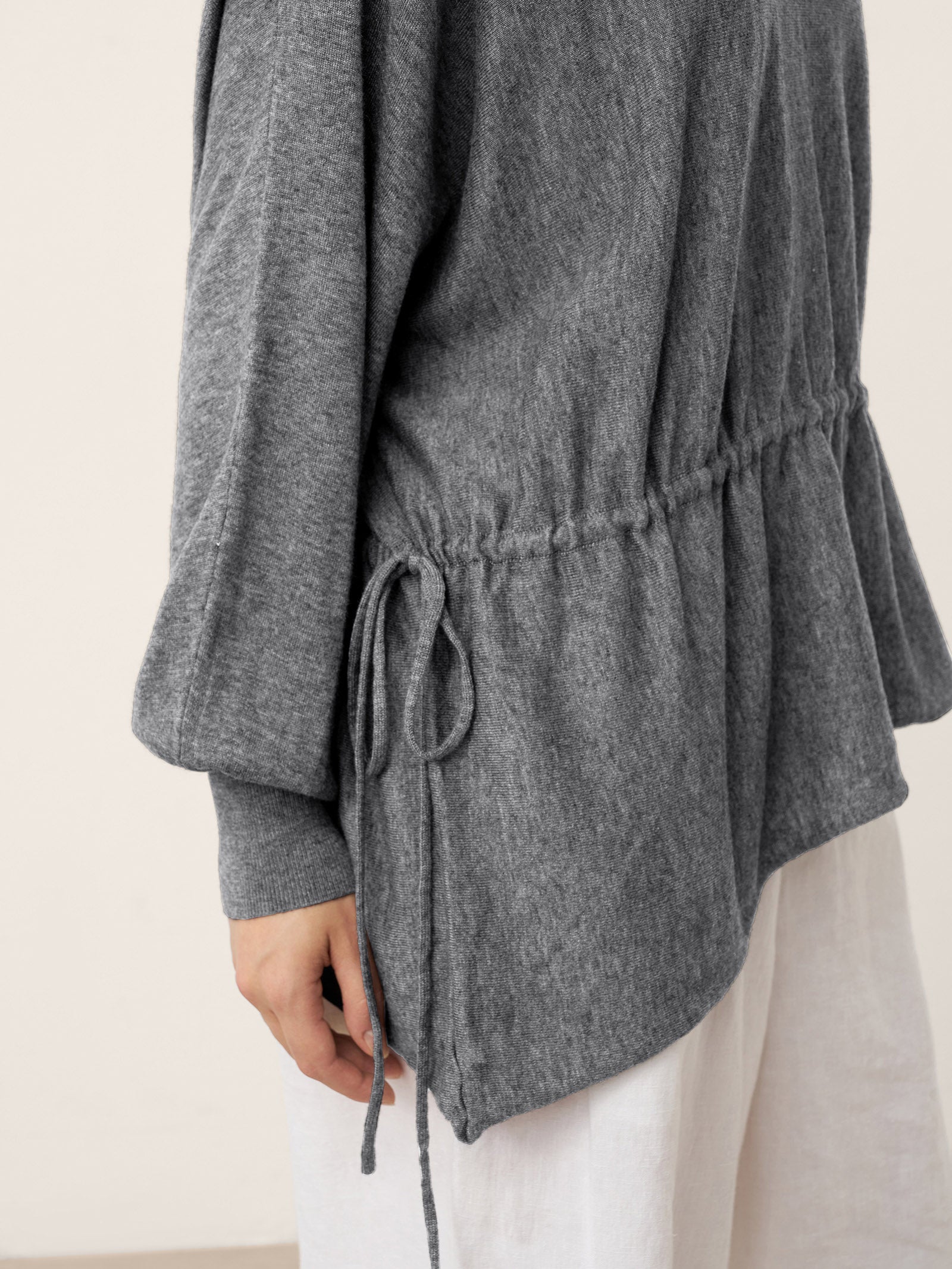 Merino Wool Asymmetric Drawstring Hem Loose Top WREN by LINTICO for women