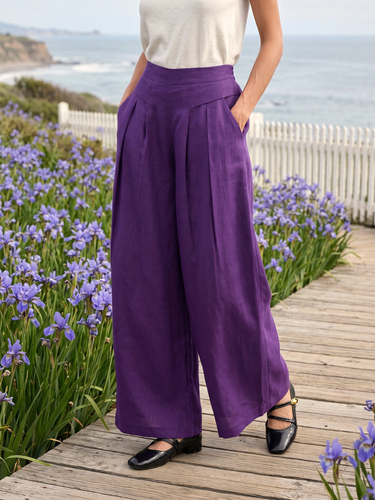 LOUISA dark purple wide leg linen pants worn outdoors