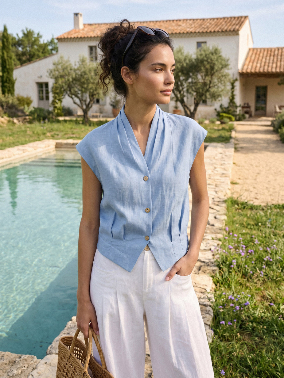 Linen Gathered-Hem Split-Neck Midi Dress SYDNEY in Haze Stripe at a seaside table