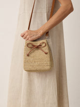 Mini Handwoven Raffia Drawstring Crossbody Bag by LINTICO for women