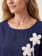 Linen-Lyocell Floral Cord Embroidered Asymmetric Hem Top FLORENE by LINTICO