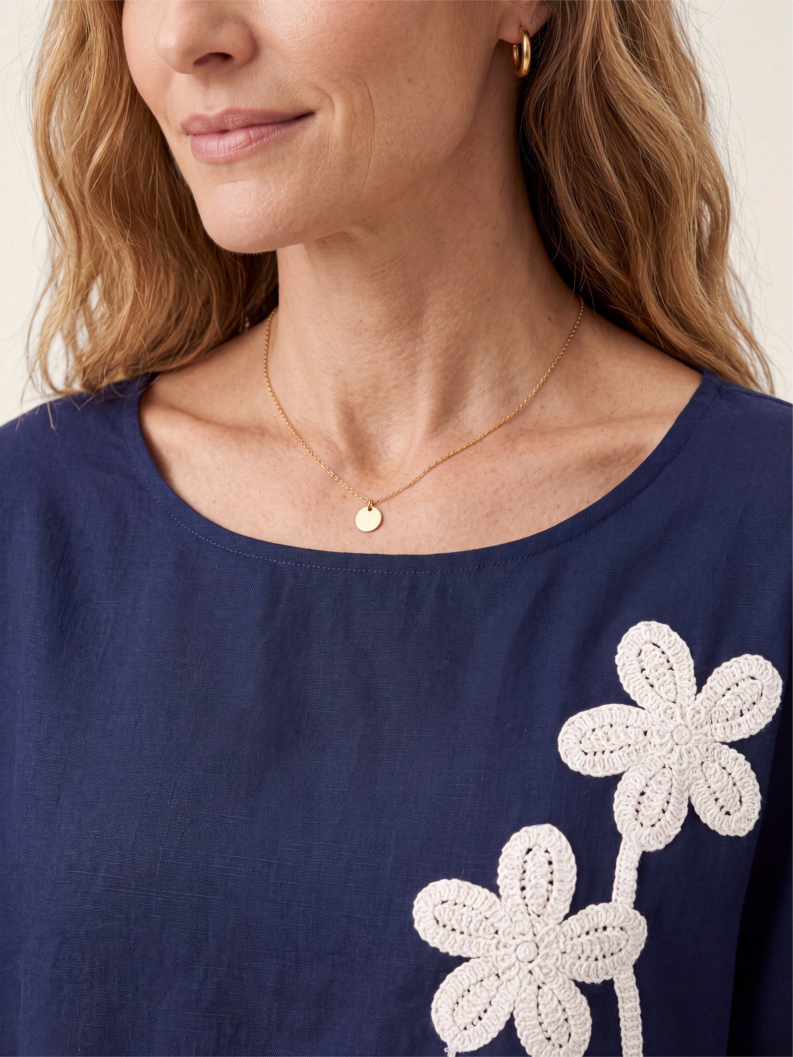 Linen-Lyocell Floral Cord Embroidered Asymmetric Hem Top FLORENE by LINTICO