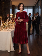 Model wearing 100% Silk Velvet Draped Pleat Relaxed Midi Dress ZELARA in Mulberry Wine