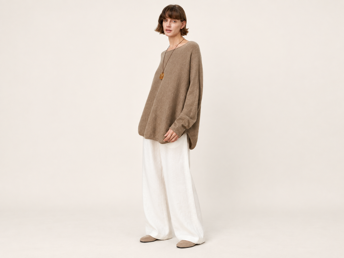 Soft cashmere knit texture in a warm neutral tone